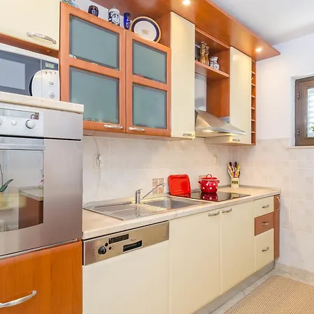 The Modern Equipped Holiday Is Located In An House. Apartment *